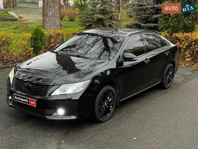 Черный Тойота Камри, объемом двигателя 2.5 л и пробегом 257 тыс. км за 13990 $, фото 4 на Automoto.ua