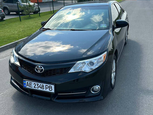 Черный Тойота Камри, объемом двигателя 2.5 л и пробегом 202 тыс. км за 13000 $, фото 3 на Automoto.ua