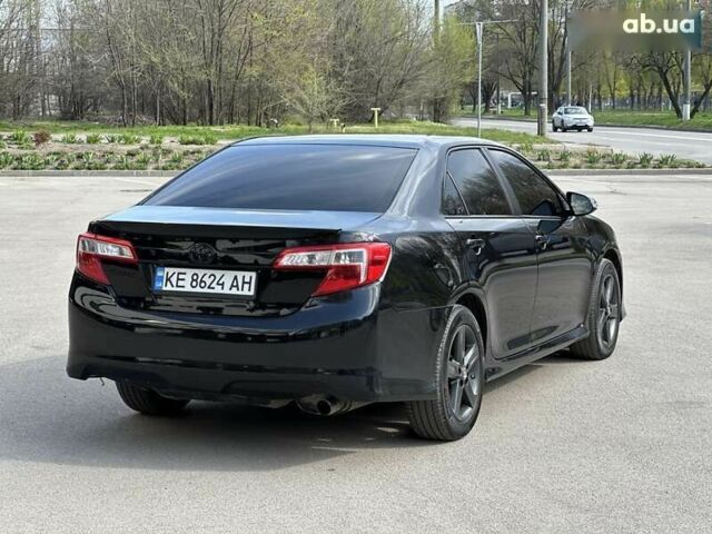 Черный Тойота Камри, объемом двигателя 2.5 л и пробегом 180 тыс. км за 11999 $, фото 21 на Automoto.ua