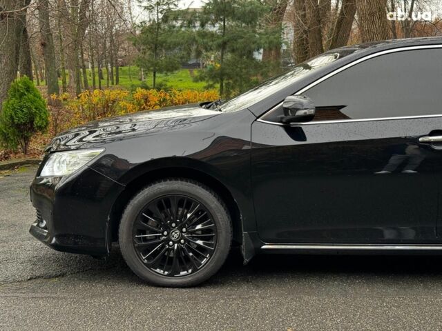 Черный Тойота Камри, объемом двигателя 2.5 л и пробегом 257 тыс. км за 13990 $, фото 12 на Automoto.ua