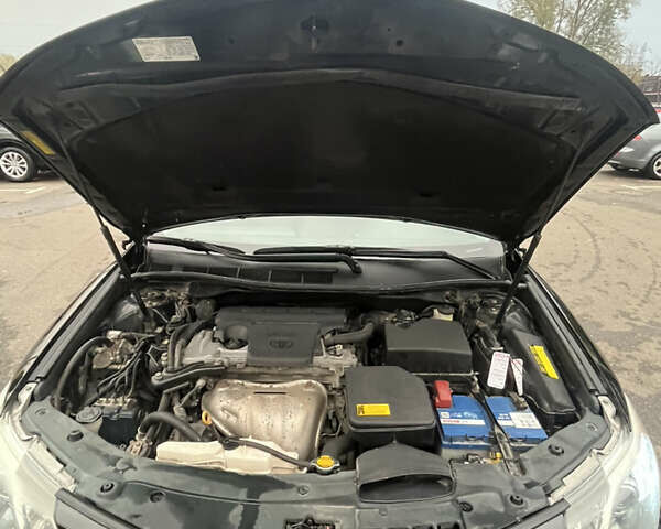 Черный Тойота Камри, объемом двигателя 2.5 л и пробегом 240 тыс. км за 14000 $, фото 26 на Automoto.ua