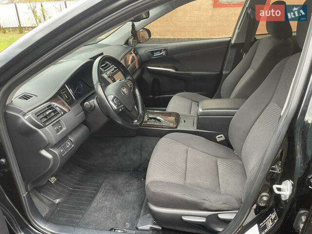 Тойота Камри 2014 в Черкассах на Automoto.ua Черный Тойота Камри, объемом двигателя 2.5 л и пробегом 189 тыс. км за 14250 $, фото 32 на Automoto.ua