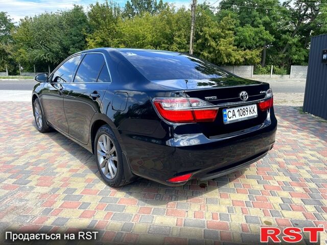 Черный Тойота Камри, объемом двигателя 2.5 л и пробегом 188 тыс. км за 14500 $, фото 1 на Automoto.ua