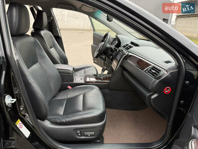 Черный Тойота Камри, объемом двигателя 2.5 л и пробегом 153 тыс. км за 16700 $, фото 24 на Automoto.ua