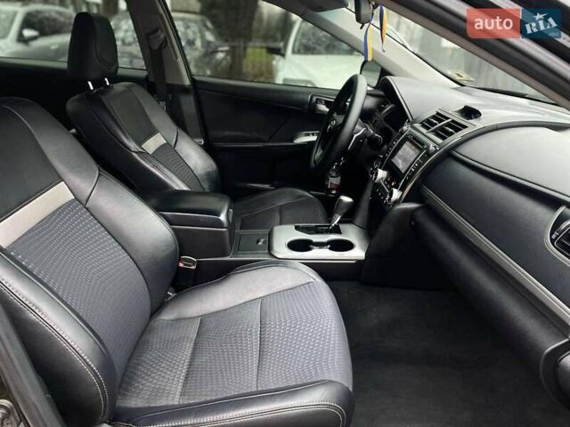 Черный Тойота Камри, объемом двигателя 2.49 л и пробегом 210 тыс. км за 12300 $, фото 19 на Automoto.ua