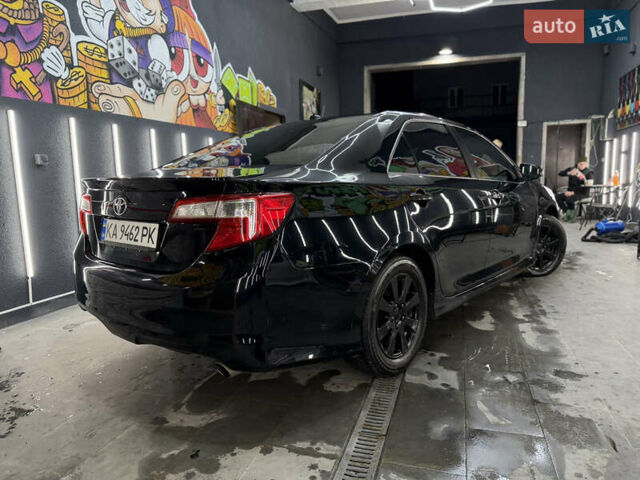 Черный Тойота Камри, объемом двигателя 2.49 л и пробегом 256 тыс. км за 11500 $, фото 2 на Automoto.ua
