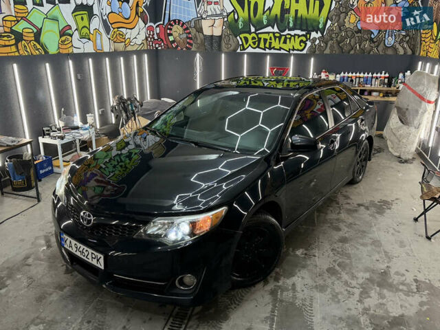 Черный Тойота Камри, объемом двигателя 2.49 л и пробегом 256 тыс. км за 11500 $, фото 1 на Automoto.ua