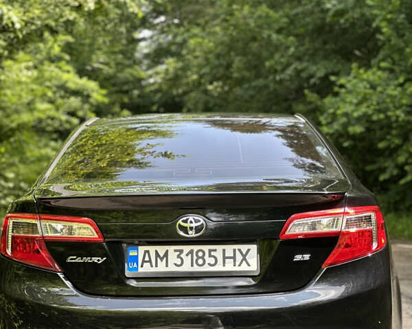 Черный Тойота Камри, объемом двигателя 2.5 л и пробегом 156 тыс. км за 11800 $, фото 6 на Automoto.ua