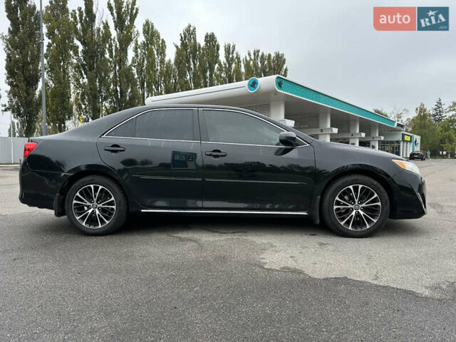 Черный Тойота Камри, объемом двигателя 2.49 л и пробегом 220 тыс. км за 10900 $, фото 3 на Automoto.ua