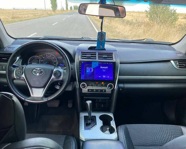 Чорний Тойота Камрі, об'ємом двигуна 2.49 л та пробігом 190 тис. км за 12250 $, фото 9 на Automoto.ua