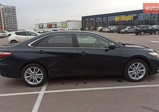 Чорний Тойота Камрі, об'ємом двигуна 2.49 л та пробігом 195 тис. км за 12100 $, фото 5 на Automoto.ua