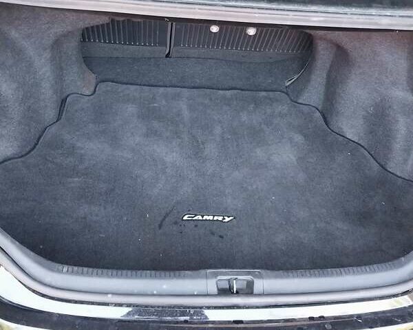 Черный Тойота Камри, объемом двигателя 2.5 л и пробегом 130 тыс. км за 12100 $, фото 12 на Automoto.ua