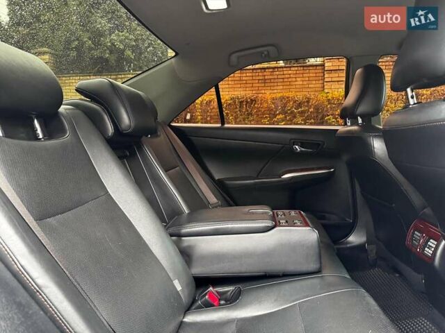Черный Тойота Камри, объемом двигателя 2.5 л и пробегом 257 тыс. км за 13990 $, фото 31 на Automoto.ua