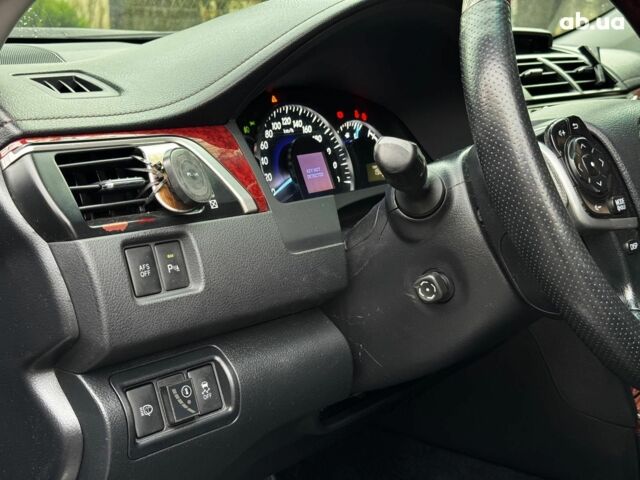 Черный Тойота Камри, объемом двигателя 2.5 л и пробегом 257 тыс. км за 13990 $, фото 25 на Automoto.ua