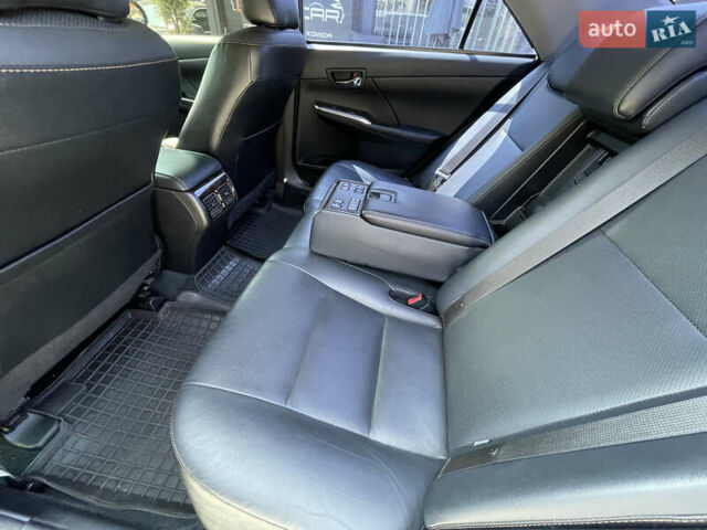 Черный Тойота Камри, объемом двигателя 2.5 л и пробегом 215 тыс. км за 16900 $, фото 24 на Automoto.ua