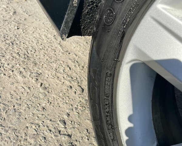 Черный Тойота Камри, объемом двигателя 2.49 л и пробегом 237 тыс. км за 12300 $, фото 1 на Automoto.ua