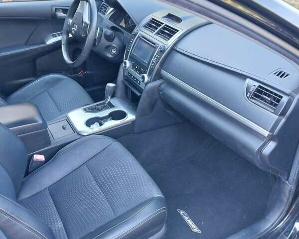 Черный Тойота Камри, объемом двигателя 2.5 л и пробегом 130 тыс. км за 12100 $, фото 6 на Automoto.ua