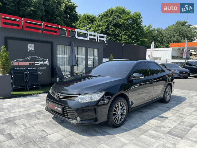 Черный Тойота Камри, объемом двигателя 2.5 л и пробегом 215 тыс. км за 16900 $, фото 1 на Automoto.ua