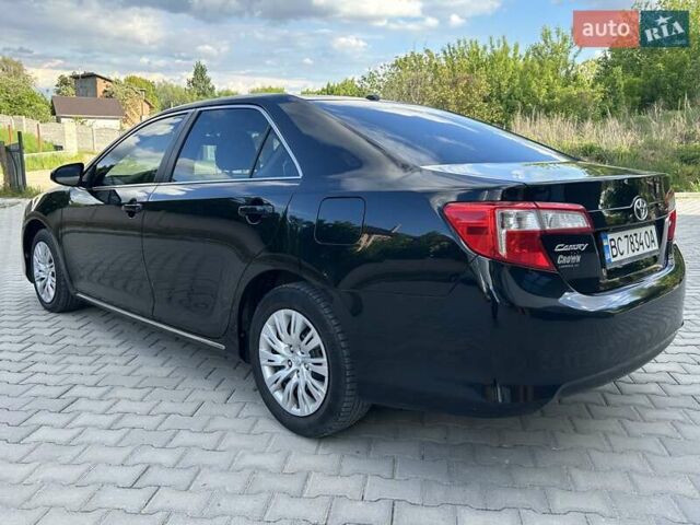 Черный Тойота Камри, объемом двигателя 2.49 л и пробегом 195 тыс. км за 11250 $, фото 9 на Automoto.ua