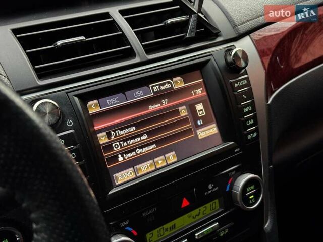 Черный Тойота Камри, объемом двигателя 2.5 л и пробегом 257 тыс. км за 13990 $, фото 21 на Automoto.ua