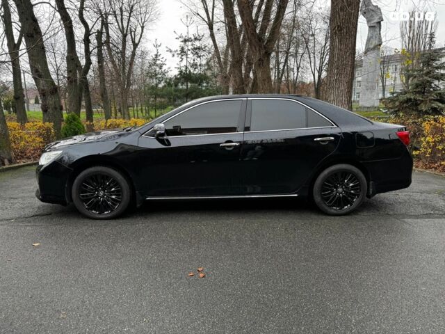 Черный Тойота Камри, объемом двигателя 2.5 л и пробегом 257 тыс. км за 13990 $, фото 13 на Automoto.ua