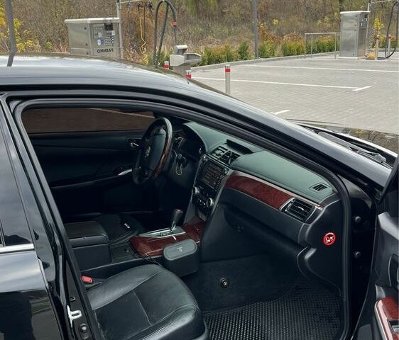 Черный Тойота Камри, объемом двигателя 2.5 л и пробегом 257 тыс. км за 15400 $, фото 18 на Automoto.ua