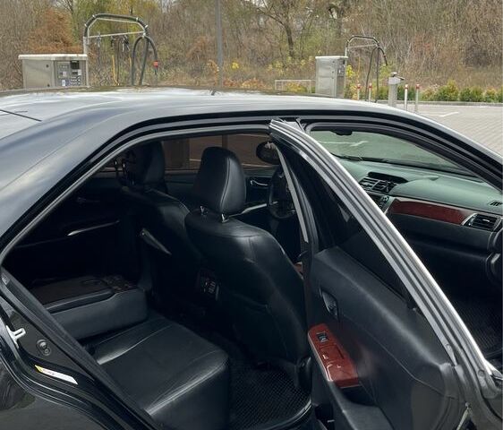Черный Тойота Камри, объемом двигателя 2.5 л и пробегом 257 тыс. км за 15400 $, фото 16 на Automoto.ua