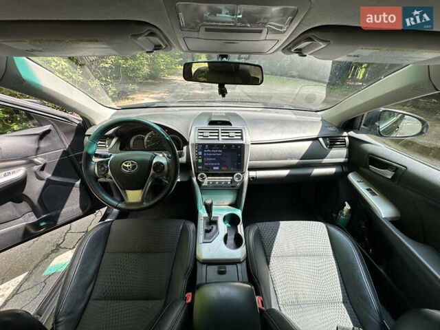 Черный Тойота Камри, объемом двигателя 2.5 л и пробегом 156 тыс. км за 11800 $, фото 4 на Automoto.ua