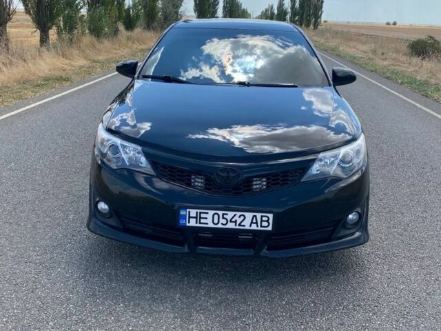 Черный Тойота Камри, объемом двигателя 2.5 л и пробегом 120 тыс. км за 12650 $, фото 1 на Automoto.ua