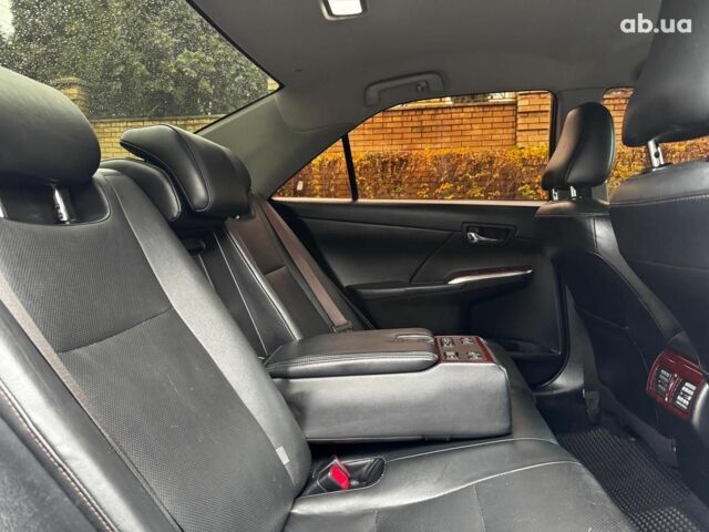 Черный Тойота Камри, объемом двигателя 2.5 л и пробегом 257 тыс. км за 13990 $, фото 31 на Automoto.ua