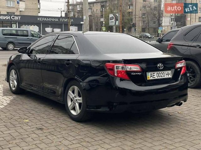 Черный Тойота Камри, объемом двигателя 2.49 л и пробегом 210 тыс. км за 12300 $, фото 9 на Automoto.ua