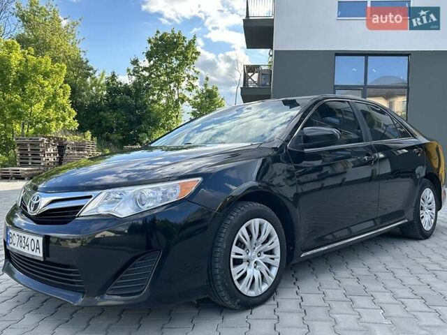 Черный Тойота Камри, объемом двигателя 2.49 л и пробегом 195 тыс. км за 11250 $, фото 11 на Automoto.ua