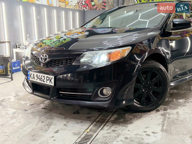 Черный Тойота Камри, объемом двигателя 2.49 л и пробегом 256 тыс. км за 11500 $, фото 16 на Automoto.ua