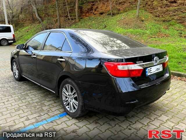 Черный Тойота Камри, объемом двигателя 2.5 л и пробегом 208 тыс. км за 9500 $, фото 5 на Automoto.ua