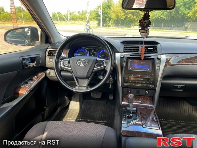 Черный Тойота Камри, объемом двигателя 2.5 л и пробегом 188 тыс. км за 14500 $, фото 2 на Automoto.ua