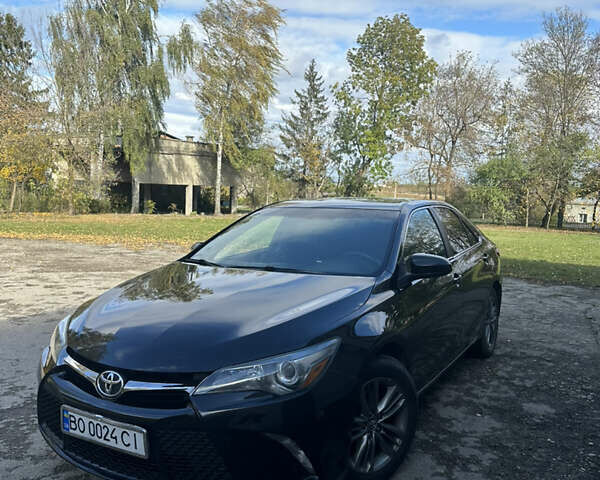 Чорний Тойота Камрі, об'ємом двигуна 2.49 л та пробігом 250 тис. км за 14500 $, фото 2 на Automoto.ua