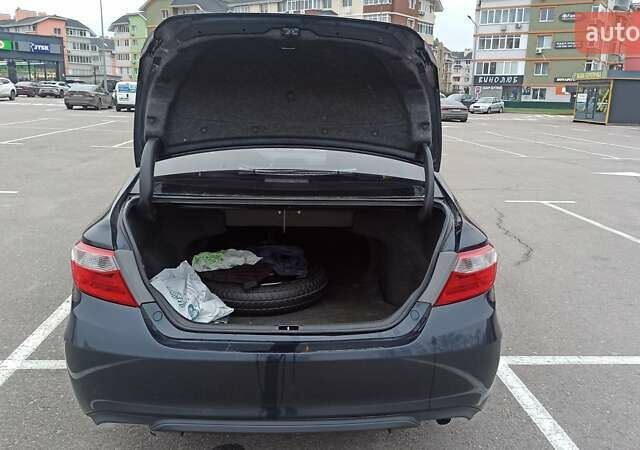 Чорний Тойота Камрі, об'ємом двигуна 2.49 л та пробігом 195 тис. км за 12100 $, фото 23 на Automoto.ua