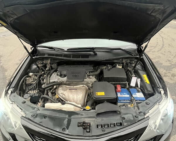 Черный Тойота Камри, объемом двигателя 2.5 л и пробегом 240 тыс. км за 14000 $, фото 25 на Automoto.ua