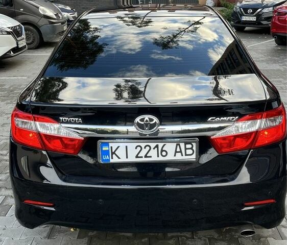 Черный Тойота Камри, объемом двигателя 2.5 л и пробегом 257 тыс. км за 15400 $, фото 1 на Automoto.ua