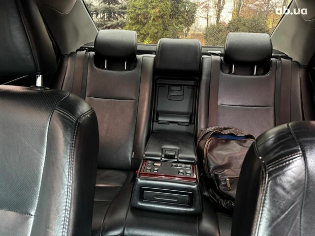Черный Тойота Камри, объемом двигателя 2.5 л и пробегом 257 тыс. км за 13990 $, фото 24 на Automoto.ua