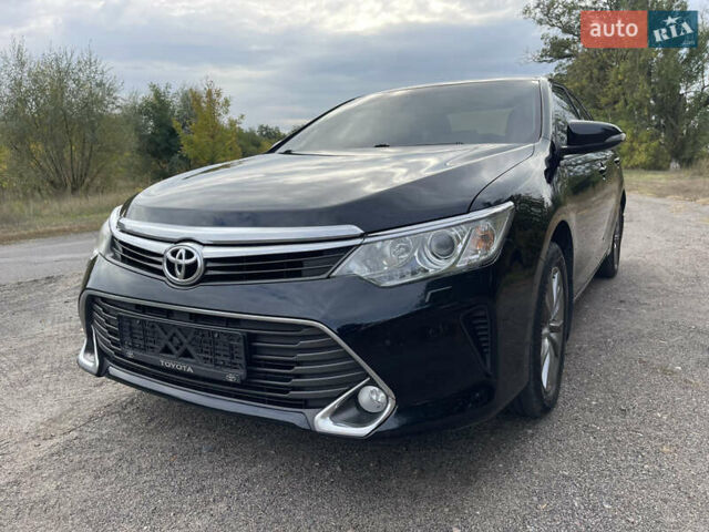 Черный Тойота Камри, объемом двигателя 2.5 л и пробегом 188 тыс. км за 14500 $, фото 1 на Automoto.ua