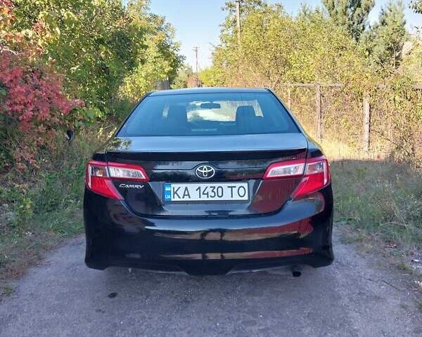 Черный Тойота Камри, объемом двигателя 2.5 л и пробегом 130 тыс. км за 12100 $, фото 4 на Automoto.ua