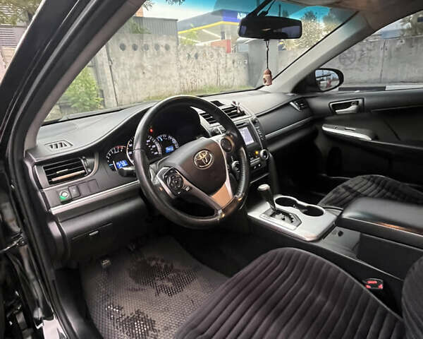 Черный Тойота Камри, объемом двигателя 2.5 л и пробегом 240 тыс. км за 14000 $, фото 17 на Automoto.ua