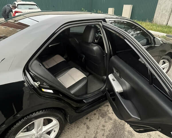 Черный Тойота Камри, объемом двигателя 2.5 л и пробегом 240 тыс. км за 14000 $, фото 21 на Automoto.ua