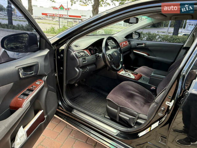 Черный Тойота Камри, объемом двигателя 2.49 л и пробегом 192 тыс. км за 14699 $, фото 17 на Automoto.ua