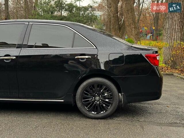 Черный Тойота Камри, объемом двигателя 2.5 л и пробегом 257 тыс. км за 13990 $, фото 11 на Automoto.ua
