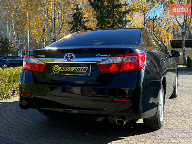 Черный Тойота Камри, объемом двигателя 2.49 л и пробегом 260 тыс. км за 13750 $, фото 6 на Automoto.ua