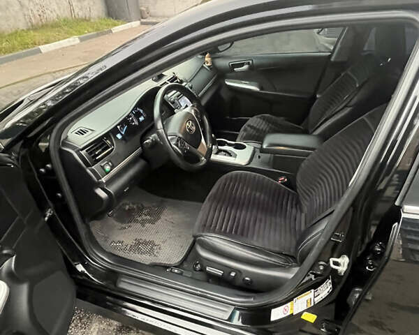 Черный Тойота Камри, объемом двигателя 2.5 л и пробегом 240 тыс. км за 14000 $, фото 16 на Automoto.ua