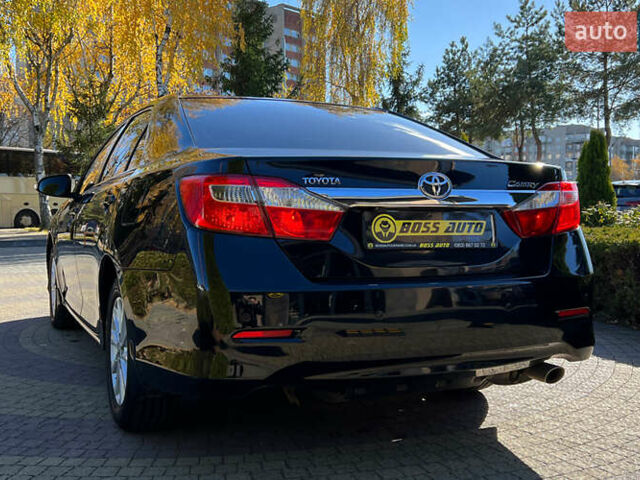 Черный Тойота Камри, объемом двигателя 2.49 л и пробегом 260 тыс. км за 13750 $, фото 4 на Automoto.ua