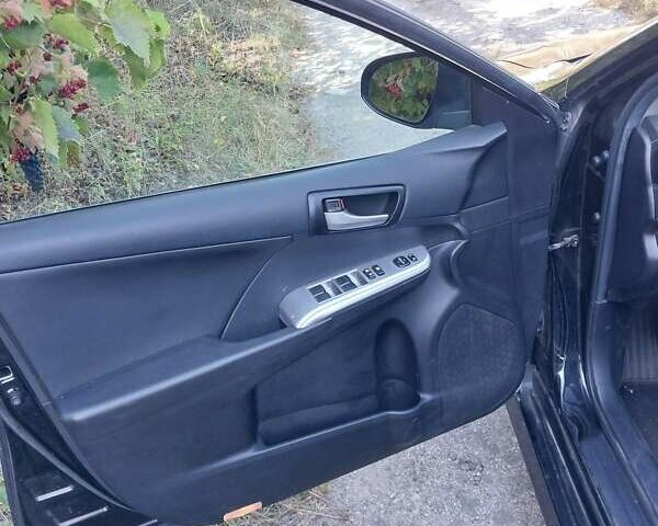 Черный Тойота Камри, объемом двигателя 2.5 л и пробегом 130 тыс. км за 12100 $, фото 10 на Automoto.ua